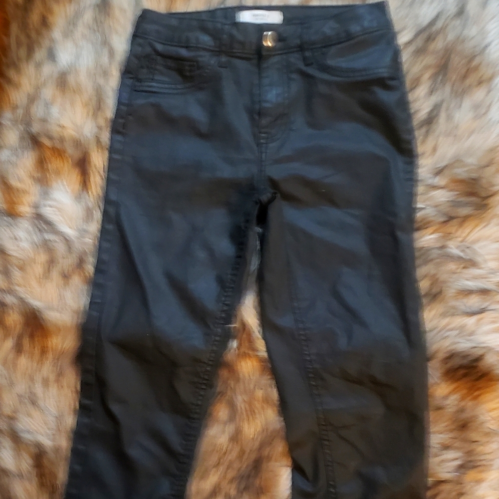 Black wax coated skinny jeans